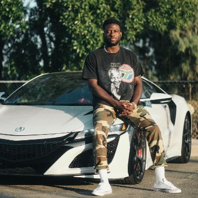 Sinqua Walls posing for a photo shoot for his Instagram feed. 